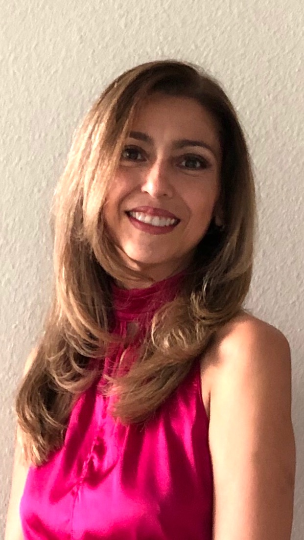 A blue and pink background with some white lines