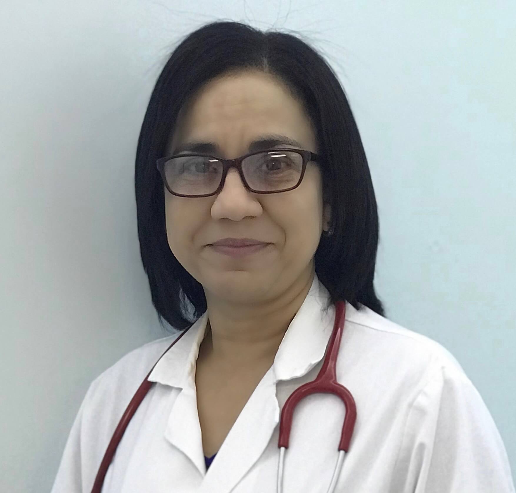 Female doctor in white coat with stethoscope
